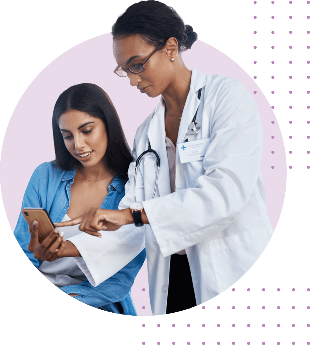 Doctor showing her patient PreTRM information on her mobile phone